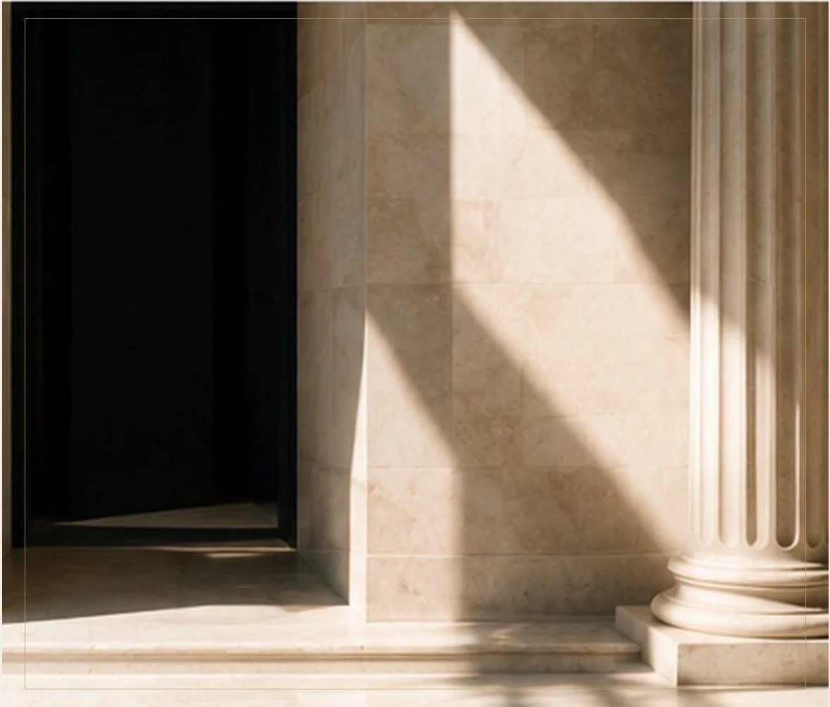 Classical stone doorway and column in natural light